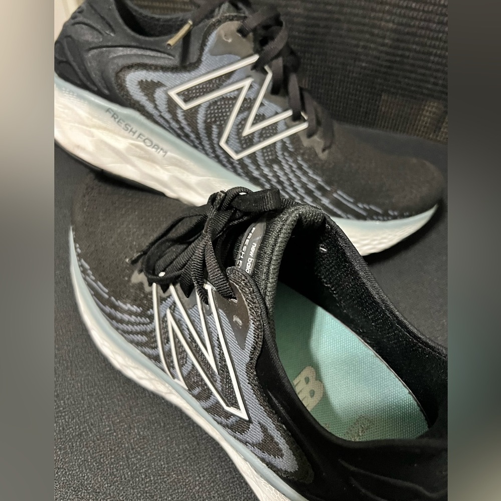 New balance 10N. Like new  black with blue trim